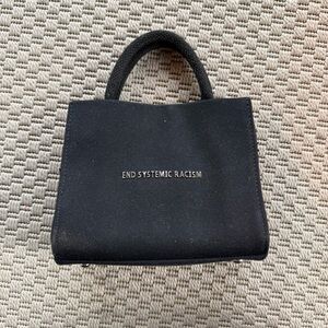 Brandon Blackwood New york end systemic racism black mini tote bag
